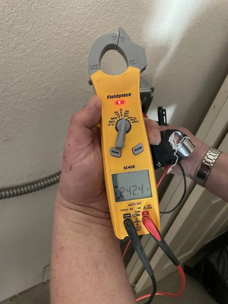 Voltage testing with clamp meter during Aluminum Wiring Replacement in Thomasville